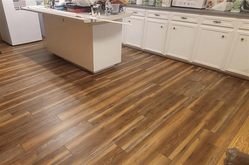 Water-resistant luxury vinyl plank installed in a family room