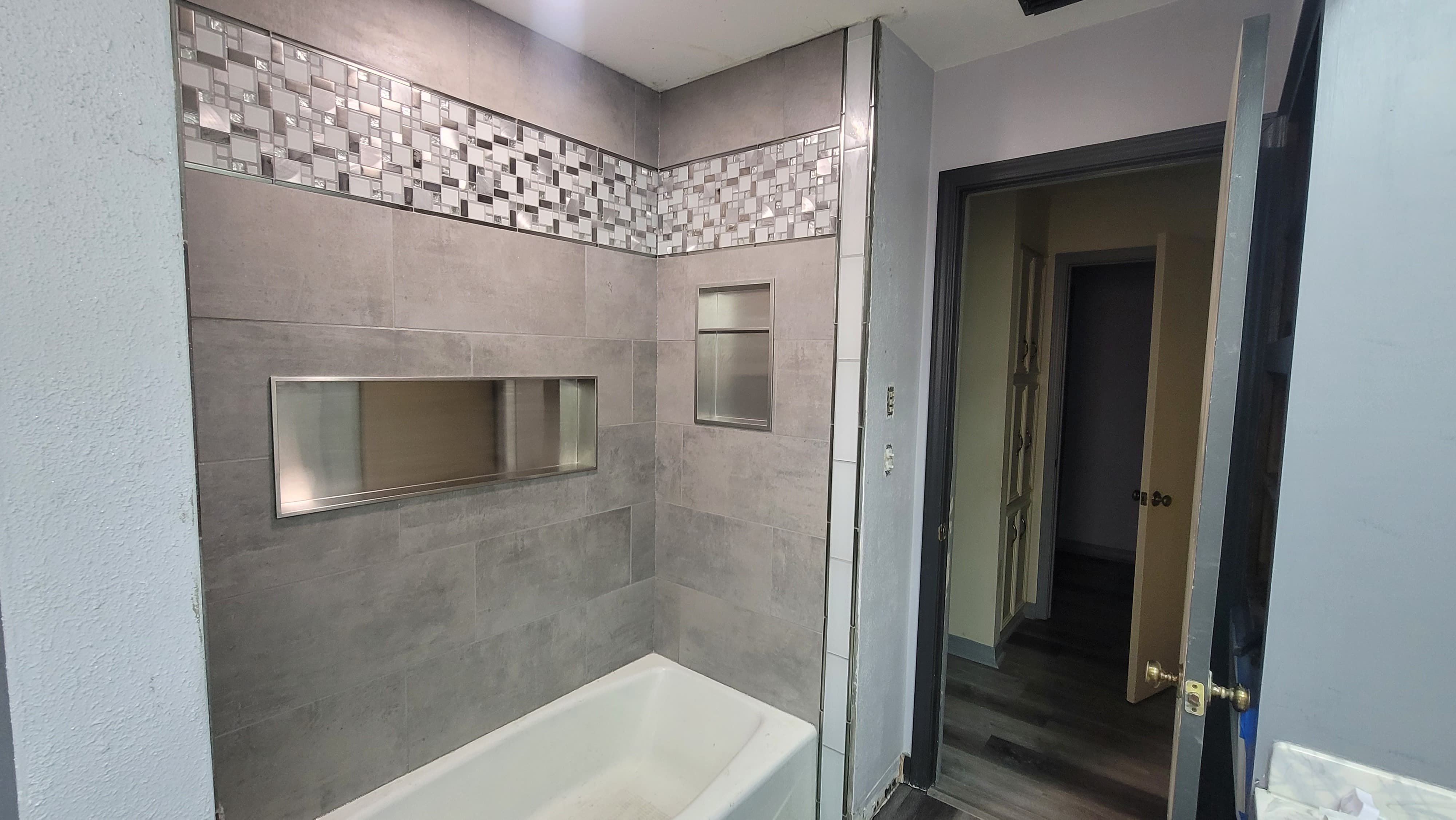 Porcelain tile floor with clean grout lines in a kitchen